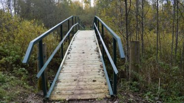 Фото: Поврежденный паводками мост восстановили в Череповецком районе