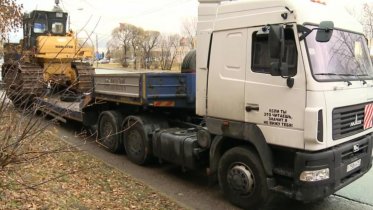 Фото: Водителя большегруза придавило в Череповце во время ремонта автомобиля