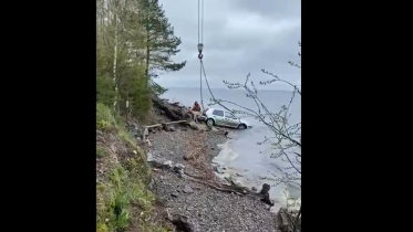 Фото: В Череповецком районе из водохранилища достали машину