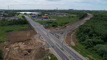 Фото: Специалисты приступили к асфальтированию Северной объездной дороги