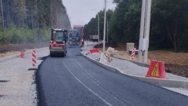 Фото: Специалисты приступили к асфальтированию дороги на Городище